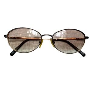 CHANEL Gold and Black Oval Glasses